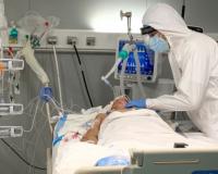 Paciente con Covid-19 ingresado en una UCI con soporte respiratorio y hemodinámico intenso